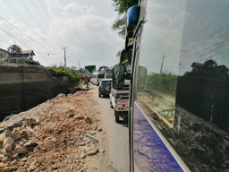 Main road from Kathmandu to Pokhara, half of it gone, let's all share.                  20211005